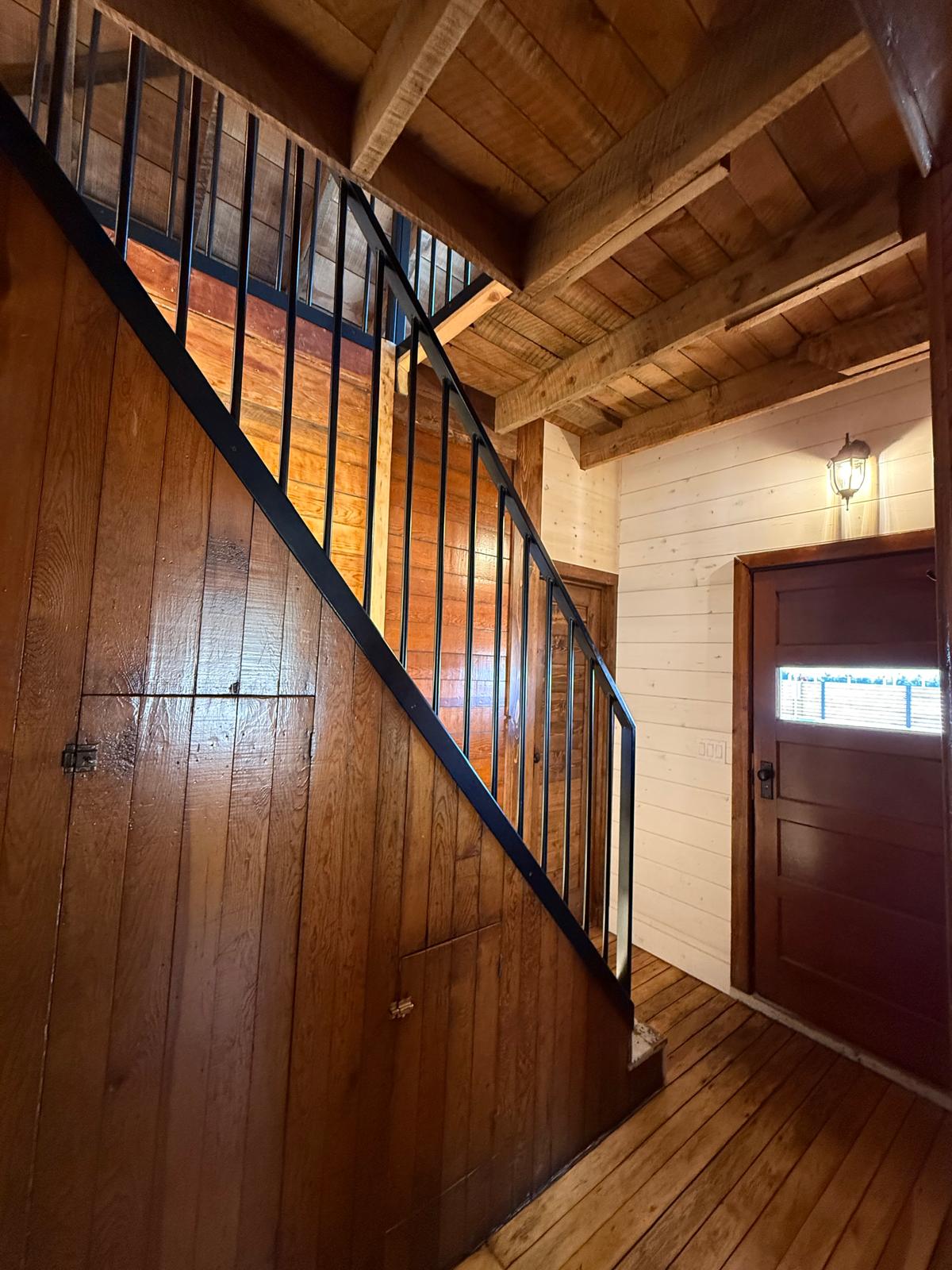 Original staircase with iron railings