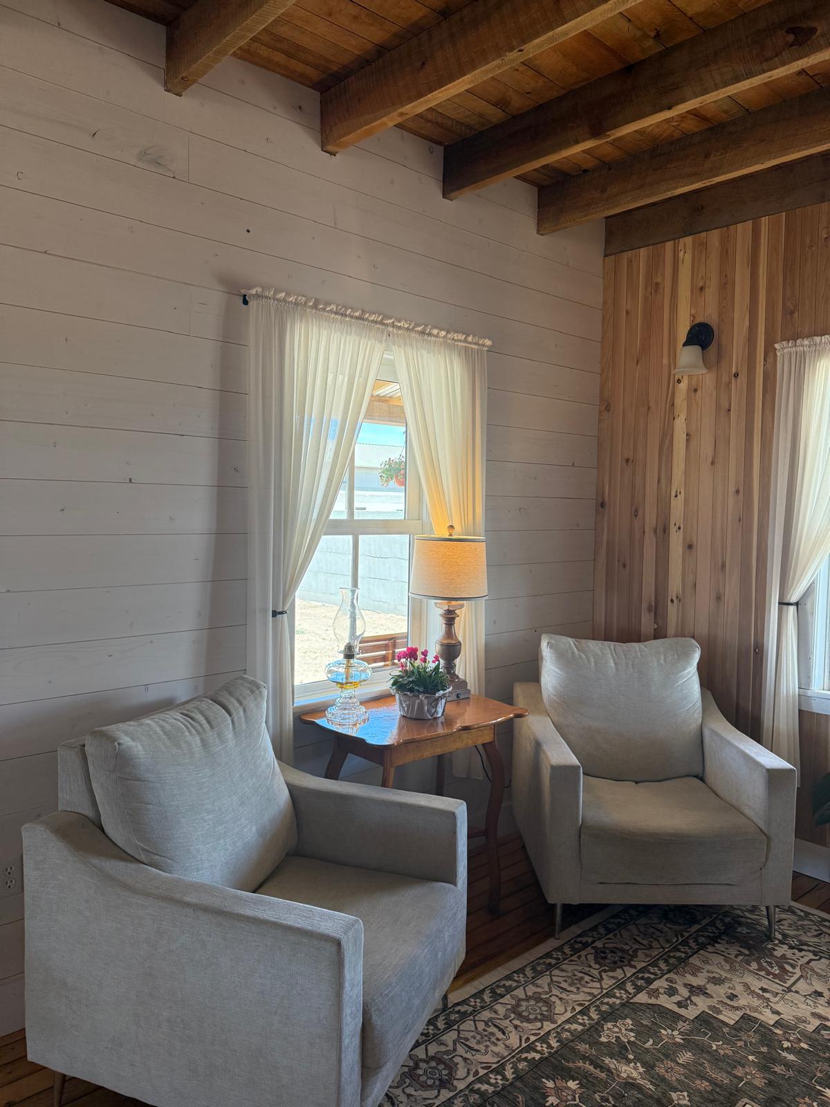 Two chairs on the porch